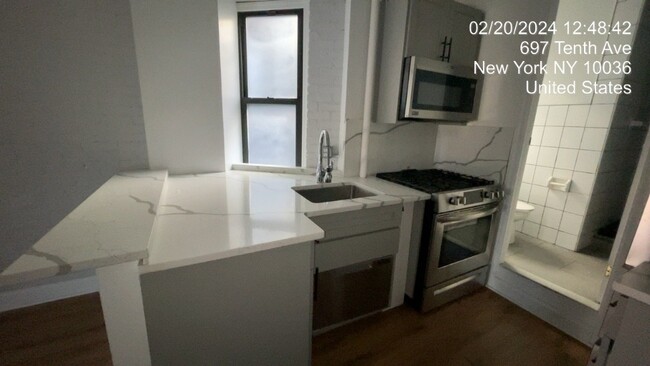 Building Photo - 697 Tenth Ave (47th & 48th St), #5RN