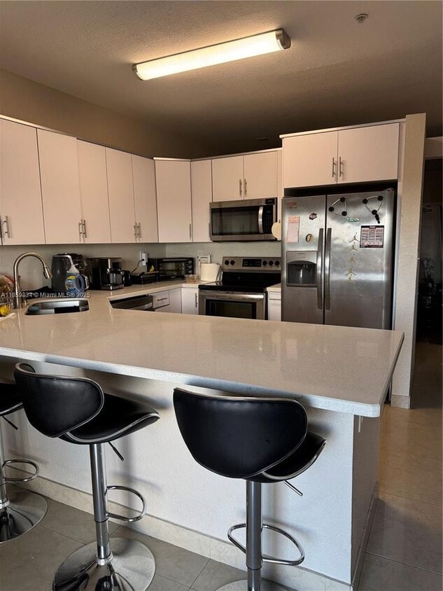 Photo - 6940 NW 179th Street 405-7, Hialeah, FL 33015