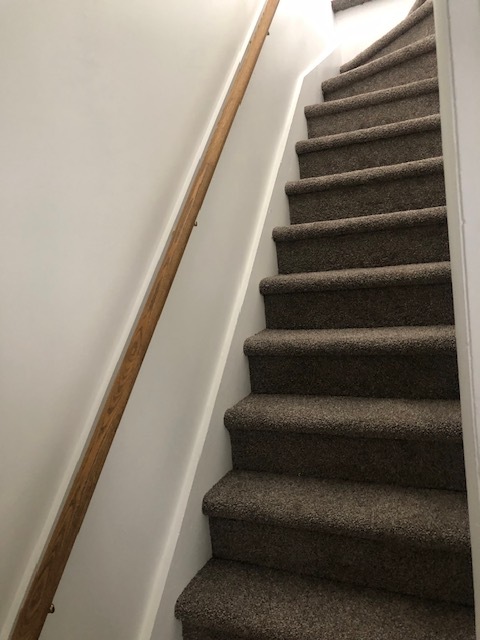 steps to the bedrooms on the second floor - 822 Mifflin St