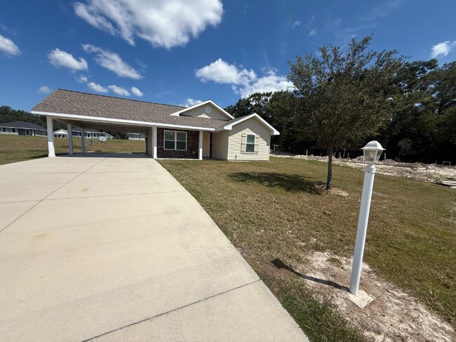 Building Photo - 3288 NE Caitlin Ln