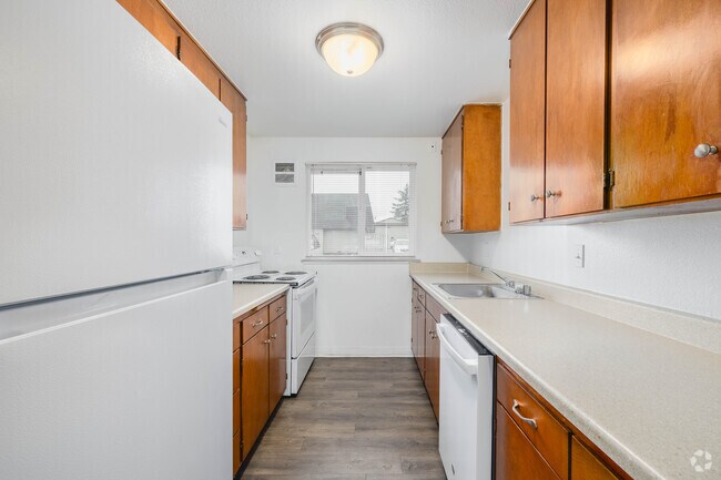 2 habitaciones, 1,5 baños - 1177 pies cuadrados - Cocina - Aladdin Townhomes