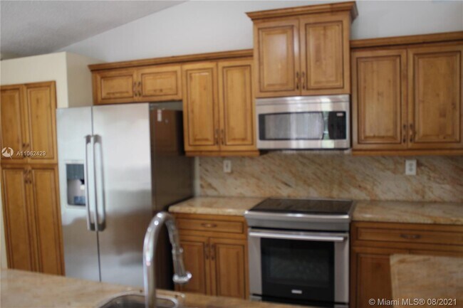 Foto del edificio - 4541 Little Palm Ln