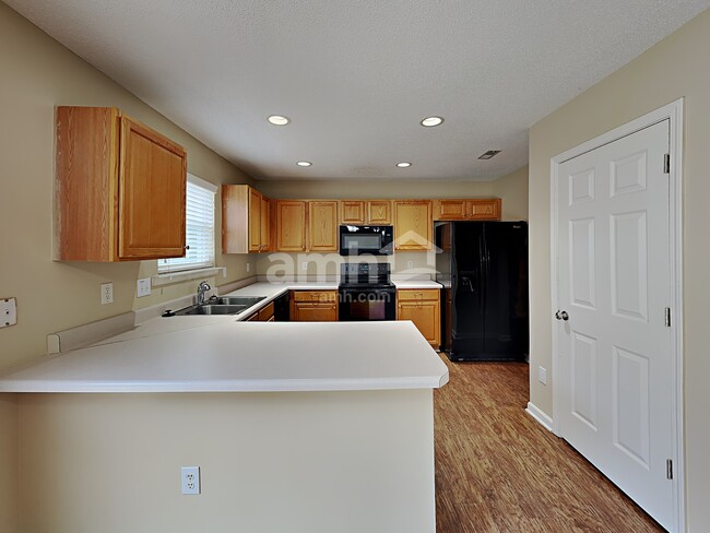 Building Photo - 4928 Alenja Ln