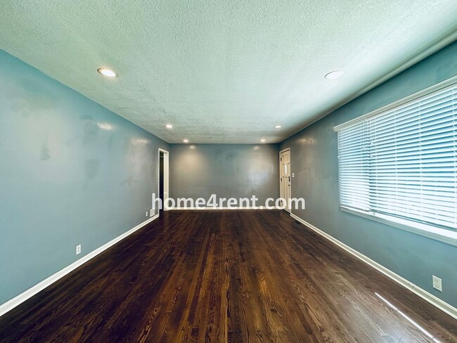 Building Photo - A Fantastic Ranch Home in Olathe with Wood...