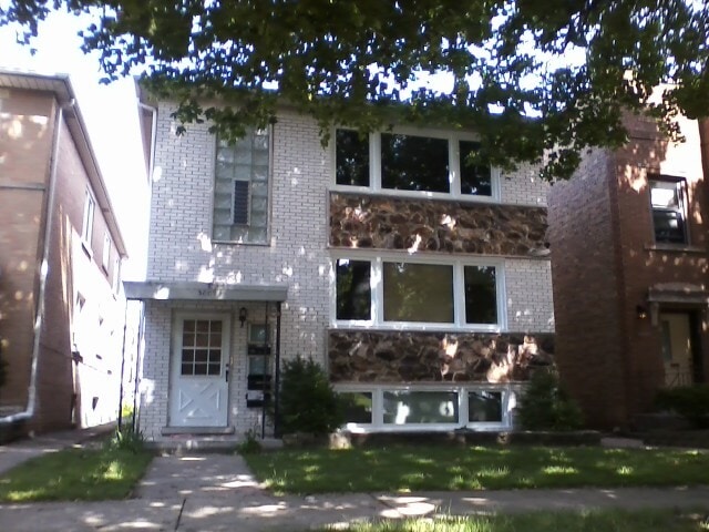 Building Photo - 5009 N Mango Ave