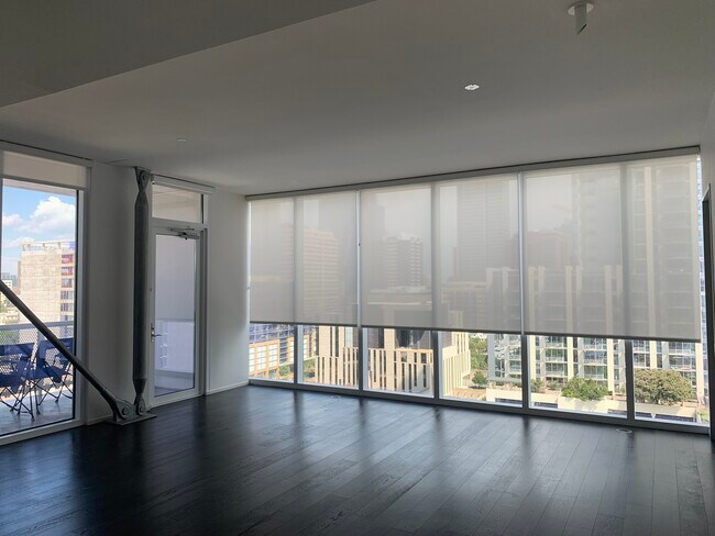 Ceiling to floor windows throughout, all with motorized shades! - 301 West Ave