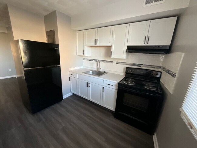 Building Photo - Experience Luxury Living at Bellagio Livin...