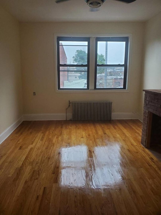 Building Photo - 59-28-59-56 56th St