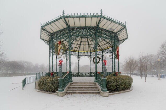 The gazebo in Welles Park covered in a light layer of snow