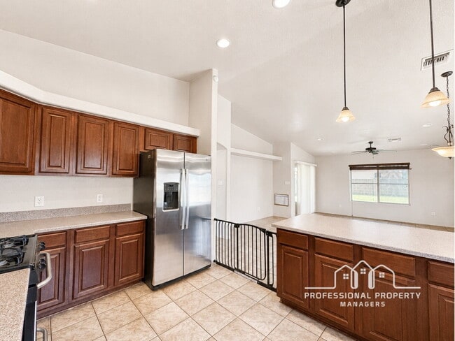 Building Photo - "Spacious 4-Bedroom, 2-Bathroom SOLAR Home in Mesa del Sol!"