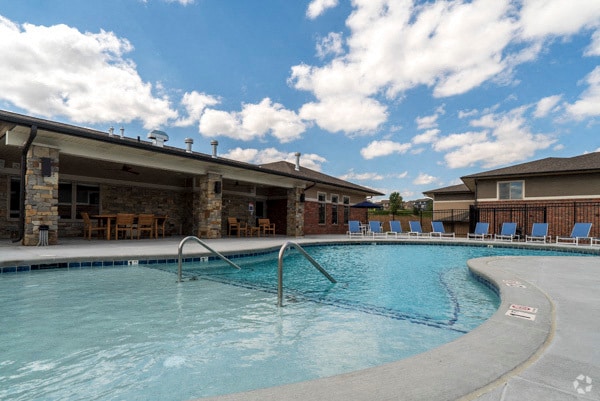 Take a dip in our pool on a hot summer day. - The Villas at Falling Waters