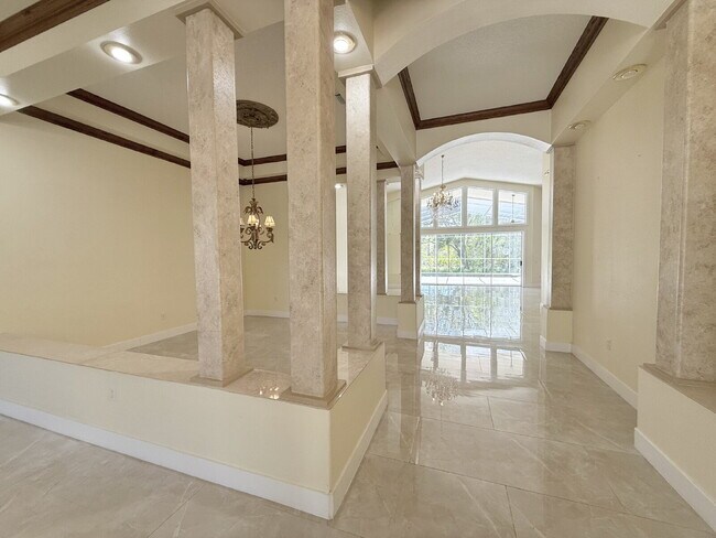 Building Photo - Stunning 5-Bedroom Pool Home in Gated Spyglass Community!