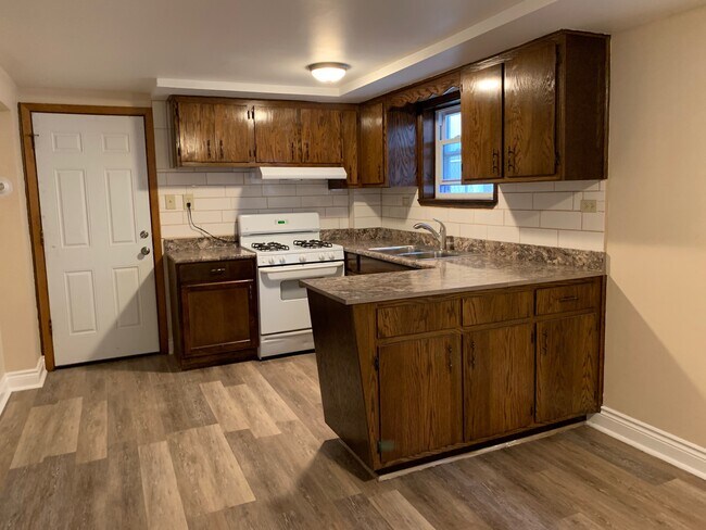 Kitchen Area newly refinished - 6136 S Narragansett Ave