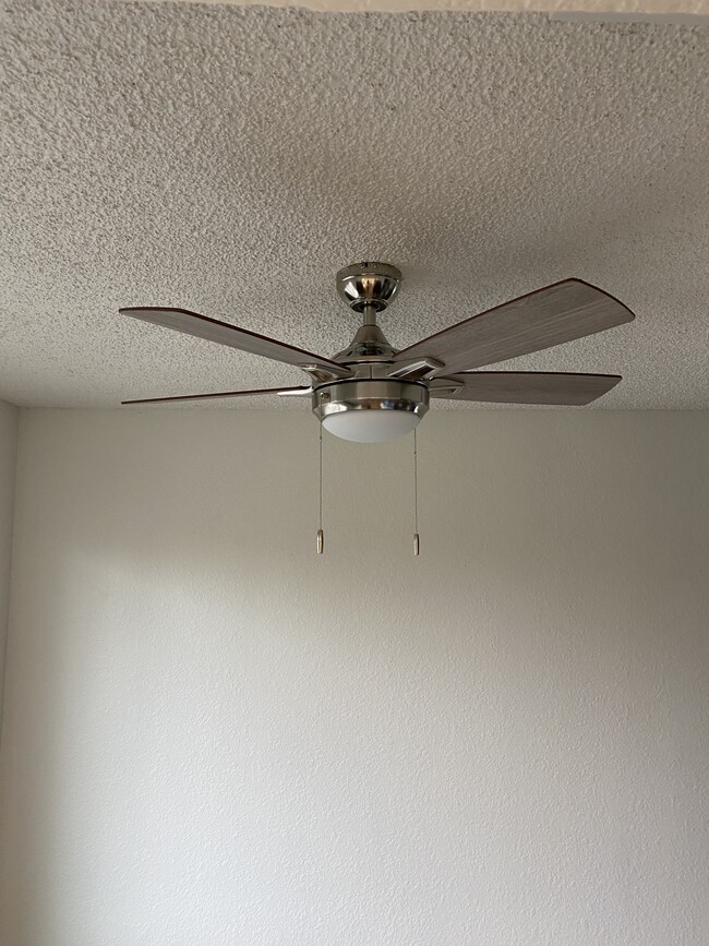 New ceiling fan in dining area. - 8953 Rancho Grande Ct