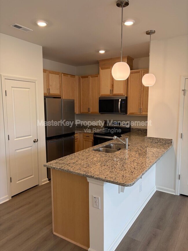Foto del edificio - 10636 Brookside Reserve Rd