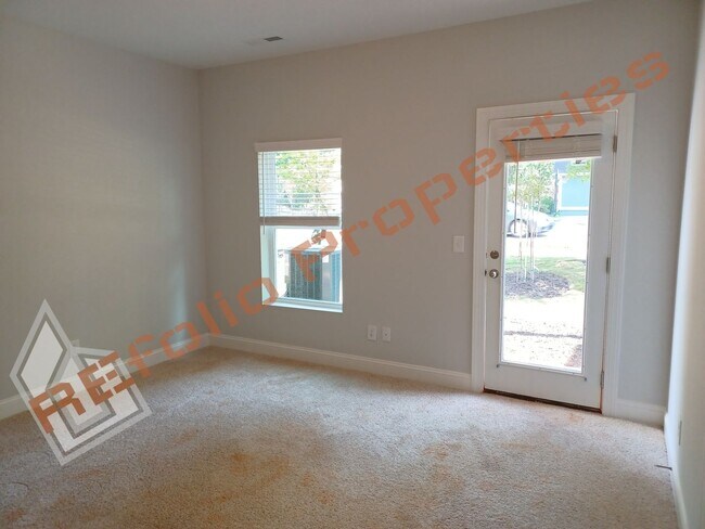 Building Photo - Built in 2022! 3 Story 3 Bedroom 1-Car Gar...
