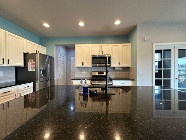 Foto del edificio - 15675 E 47th Dr