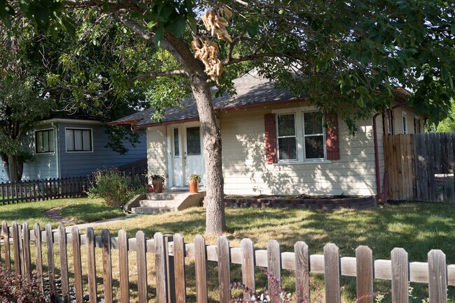 Building Photo - Evolve Real Estate: Charming Ranch Home wi...