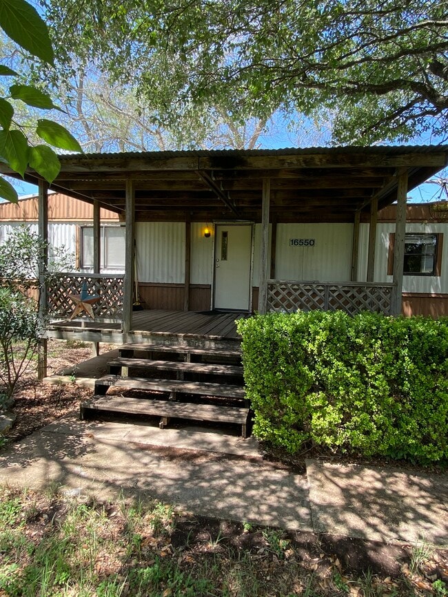 Covered front deck/porch - perfect for morning coffee, plenty of room for Table/chairs - 16550 County Road 282