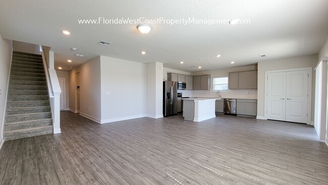 Building Photo - OUTSTANDING LARGE 4 BEDROOM/ 3 BATH HOME IN ISLES AT BAYVIEW! LARGE FLEX SPACE PLUS LAKEIVEWS!