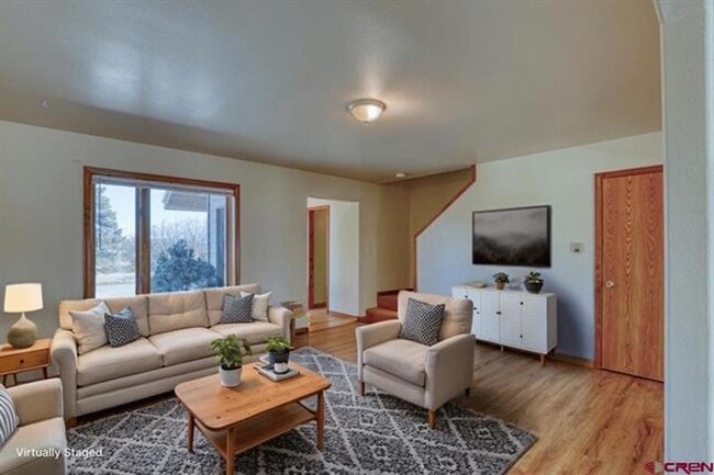 Building Photo - Spacious 2 Story Condo on East Golf
