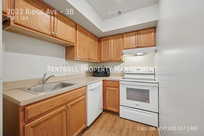 Building Photo - 7033 Ridge Ave