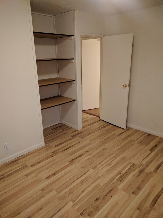 Shelving in closet of the second bedroom. - 4225 Sheffield Road