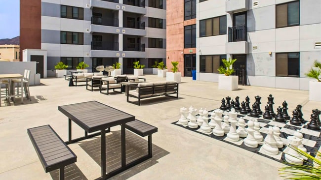 Outdoor BBQ & Game Area - Watermark Apartments