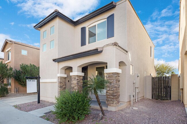 Foto del edificio - 9547 E Belmont Ave