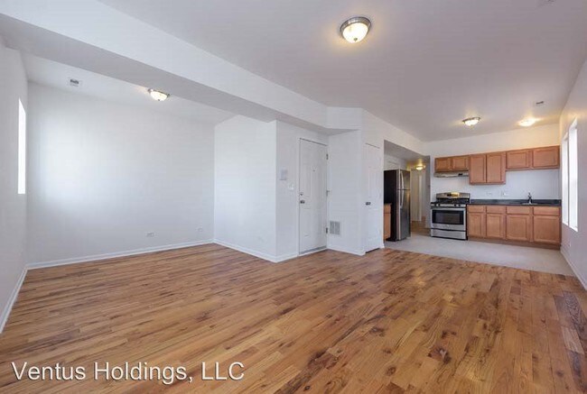 Foto del edificio - 2721-2727 E 75th Pl