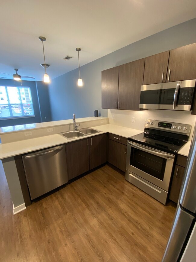 New Stainless Steel appliances! - CUE at Aksarben Village Apartments