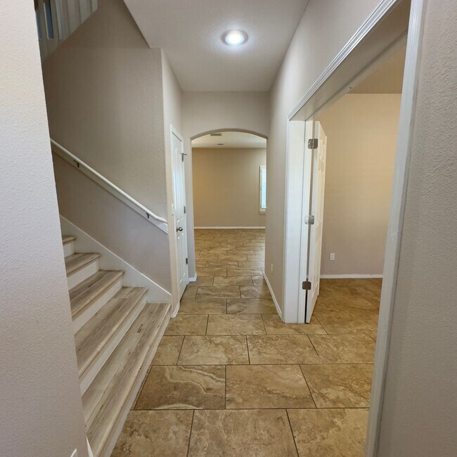 Building Photo - 4 Bedrooms, 3 Baths, a Pool, and Solar Panels!