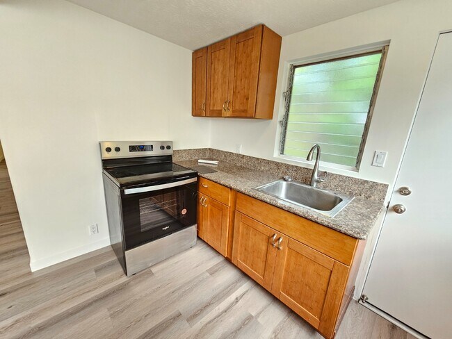 Foto del edificio - 2 bedroom, 1 bathroom with one driveway pa...