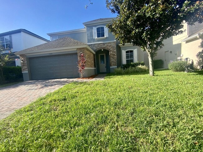 Building Photo - Spacious 5/3.5 Home in Lake Nona
