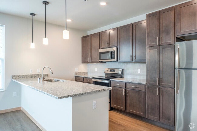 1BR, 1BA - 862SF - Kitchen - The Marquee