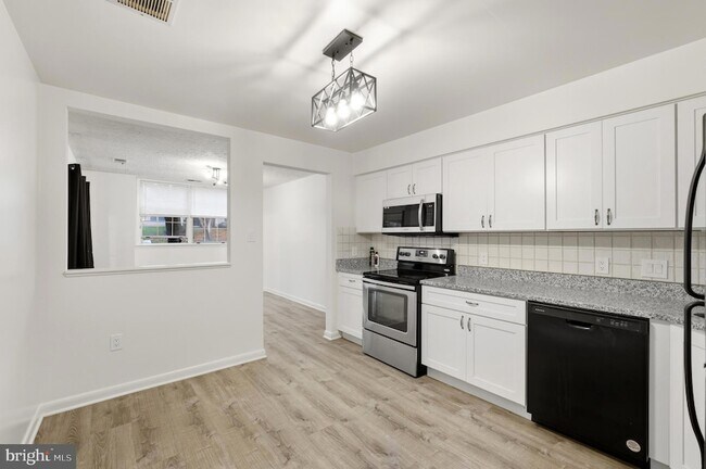 Building Photo - 2211 Woodbox Lane Unit A