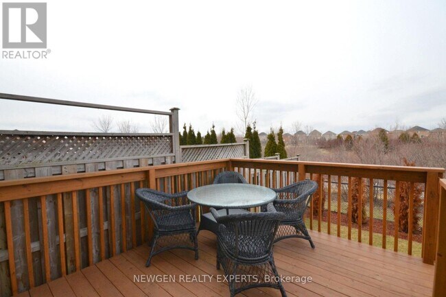 Building Photo - 122 River Rock Crescent