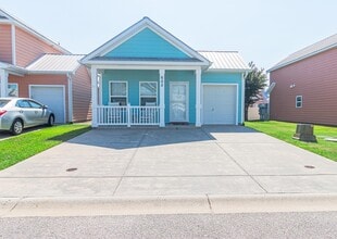 Building Photo - 605 Surfsong Way