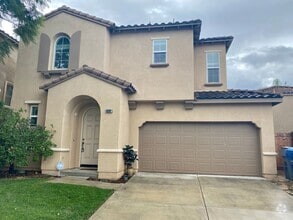 Building Photo - 6579 Guava Way