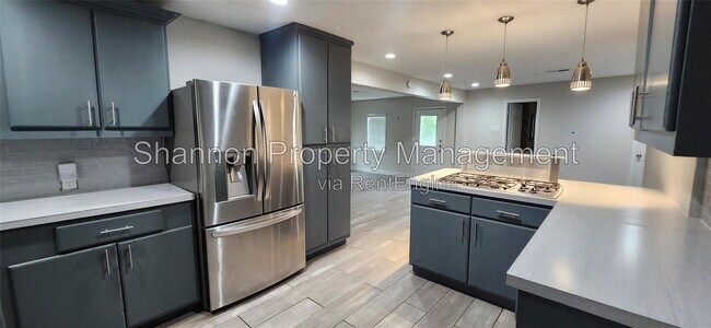 Building Photo - 5655 Meadow Creek Ln