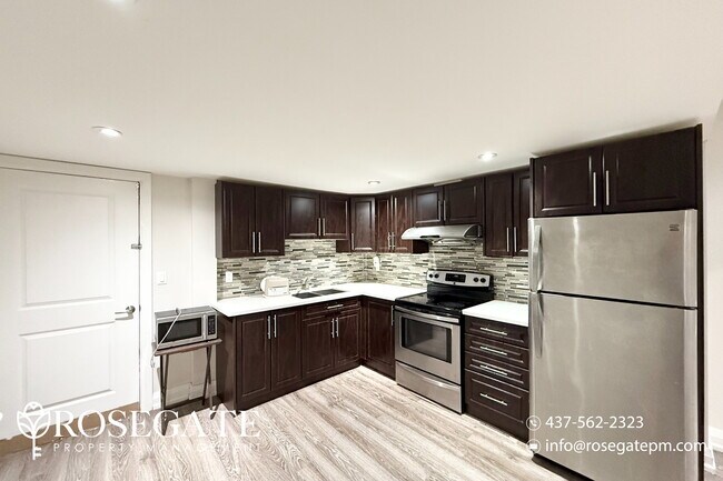 Photo du bâtiment - Spacious 1-Bedroom Apartment in Richmond H...