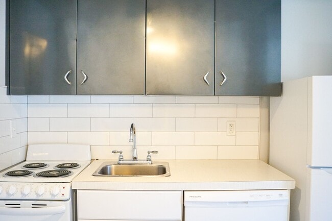 Building Photo - Great Mid-Century 1-Bdr w Dishwasher, Community Lawns + Pets OK!