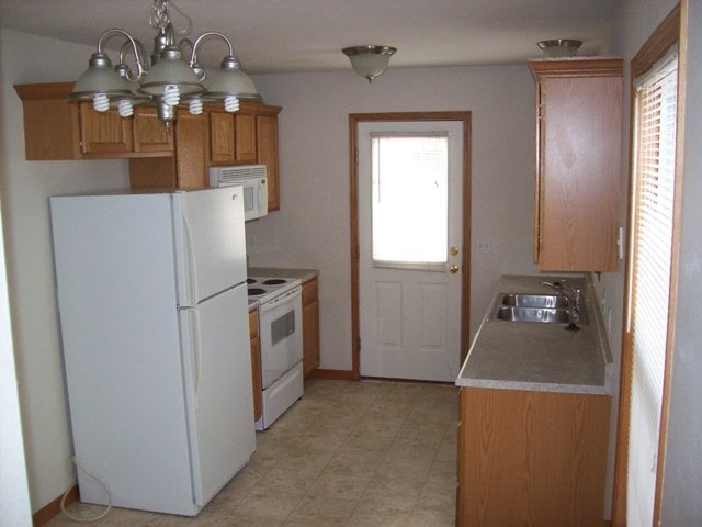 Kitchen Includes Fridge, Stove, Microwave, and Dishwasher - 3027 N Fremont Ave