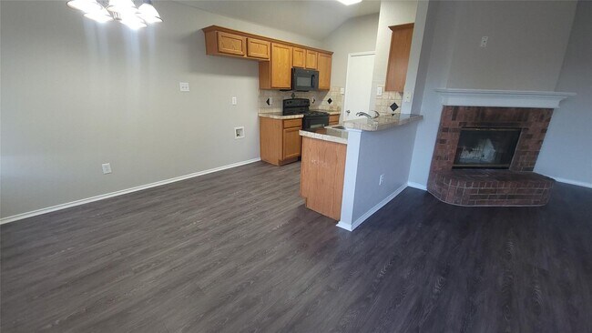 Building Photo - Discover this inviting 1,459 sq ft home, p...