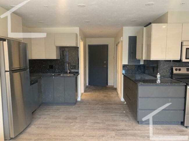 Photo - New Building, In-Unit Washer and Dryer, Central Heat/AC, Elevator, Parking for Rent Apartment