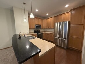 Building Photo - 8025 Larch Ln N