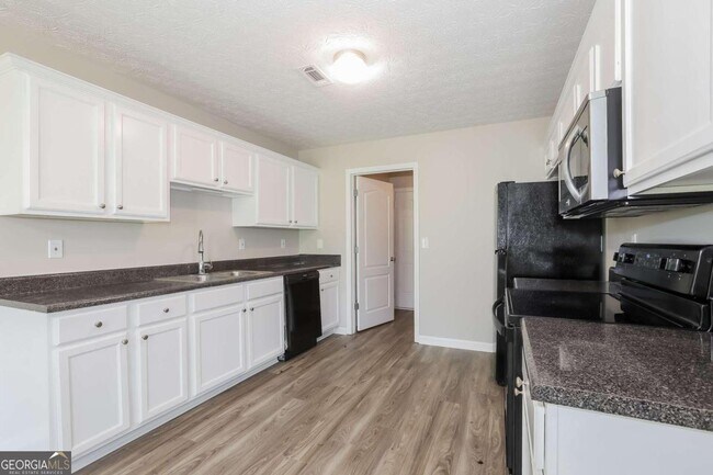 Foto del edificio - 6876 Lockley Ct