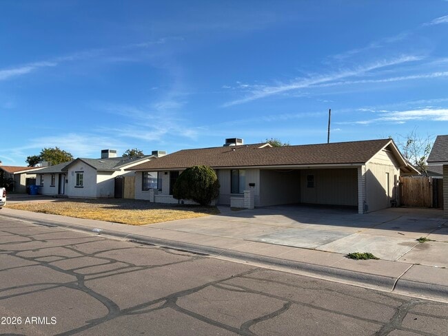 Building Photo - 8819 W Roma Ave