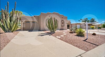 Building Photo - 8935 E Fairway Blvd