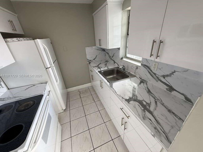 Building Photo - 7105 W 13th Ave